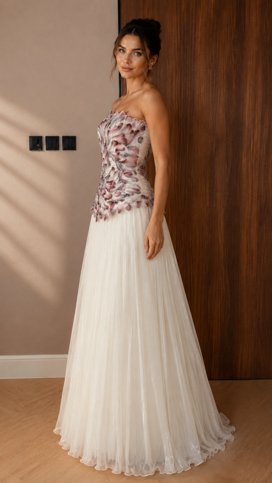 Front view of mauve and ivory strapless appliqué evening gown with pleated tulle skirt