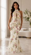 Front view of ivory floral embellished halter mermaid formal gown