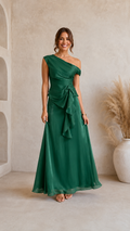 Emerald green one-shoulder maxi dress with ruched waist and cascading ruffle